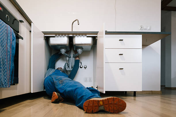 Professional Drain Cleaning technician working in Greenfield, MA